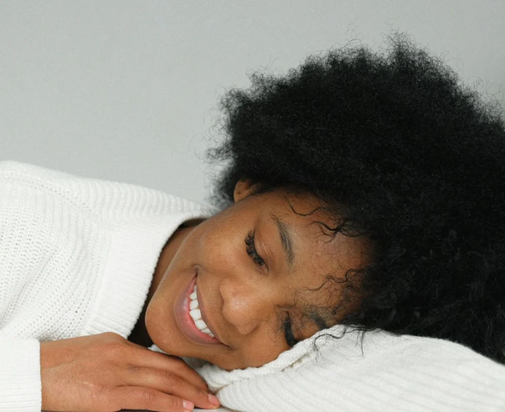 Woman laying down relaxing after hiring cleaning services